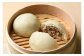 国産原料のみを使用した黒豚の旨味が詰まった肉まん！贈り物にも大人気！