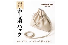 ＜シルバーホワイト＞国産本革の巾着バッグ シュリンク型押し牛革使用(ショルダー付き)【1532417】